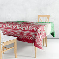 Christmas tablecloth with red and white geometric pattern and green border