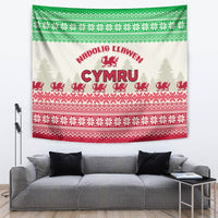 Hanging Welsh Christmas tapestry, cream center with Cymru text, red dragon, and repeating motifs.