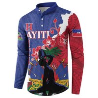Blue button sweatshirt with red side sleeves and white-and-red Haiti floral illustration