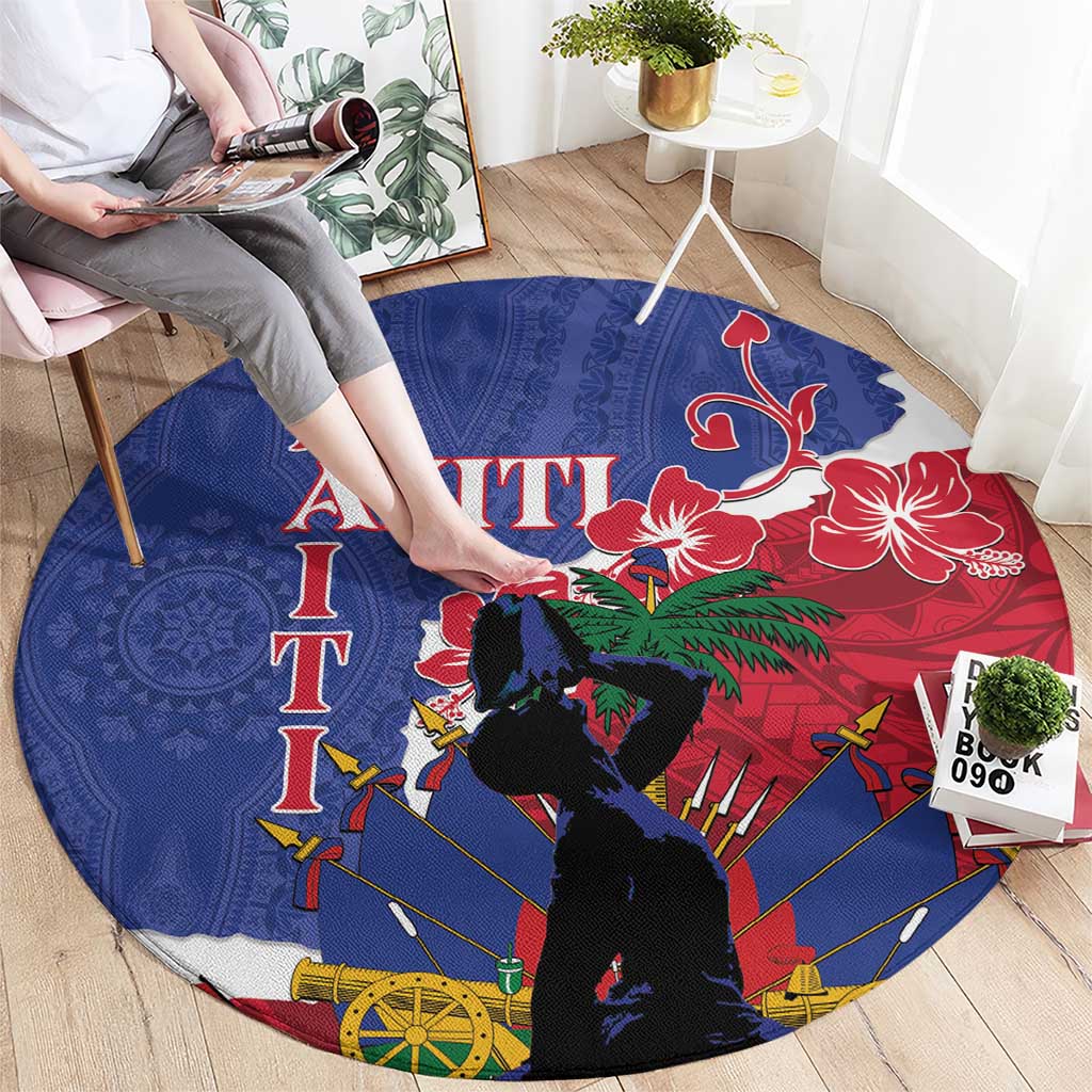 Blue round Haiti-themed carpet with red floral, dark silhouette figures, spears and wheel motifs
