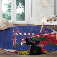 Blue round Haiti carpet with red hibiscus, dark silhouette figure, spear lines and decorative icons
