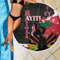 Round black beach blanket with fringe edge, red hibiscus floral and dancer scene, tropical artwork