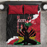 Bedding set with bold red, black, and white patterned duvet and two matching pillowcases