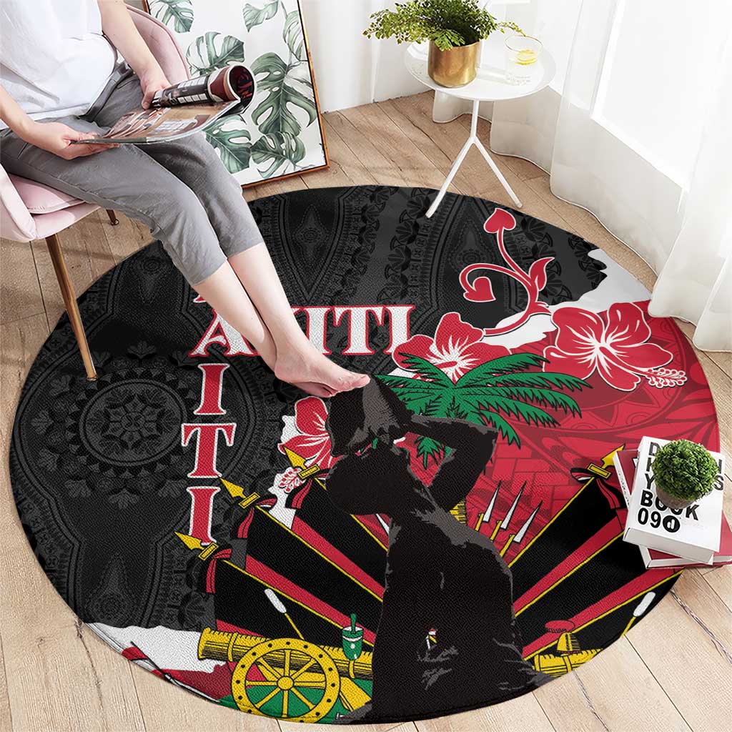 Round black carpet with red Ayiti text, hibiscus flowers, and striped canoe design