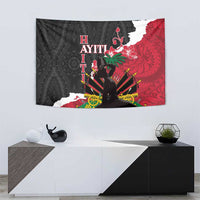 Black, red, and white Polynesian pattern tapestry with central seated silhouette on wall