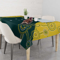 Cricket tablecloth on table with hanging corners, dark green and yellow dotted design