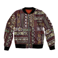 Unisex bomber jacket with brown patchwork paisley pattern, ribbed cuffs and hem, zip front