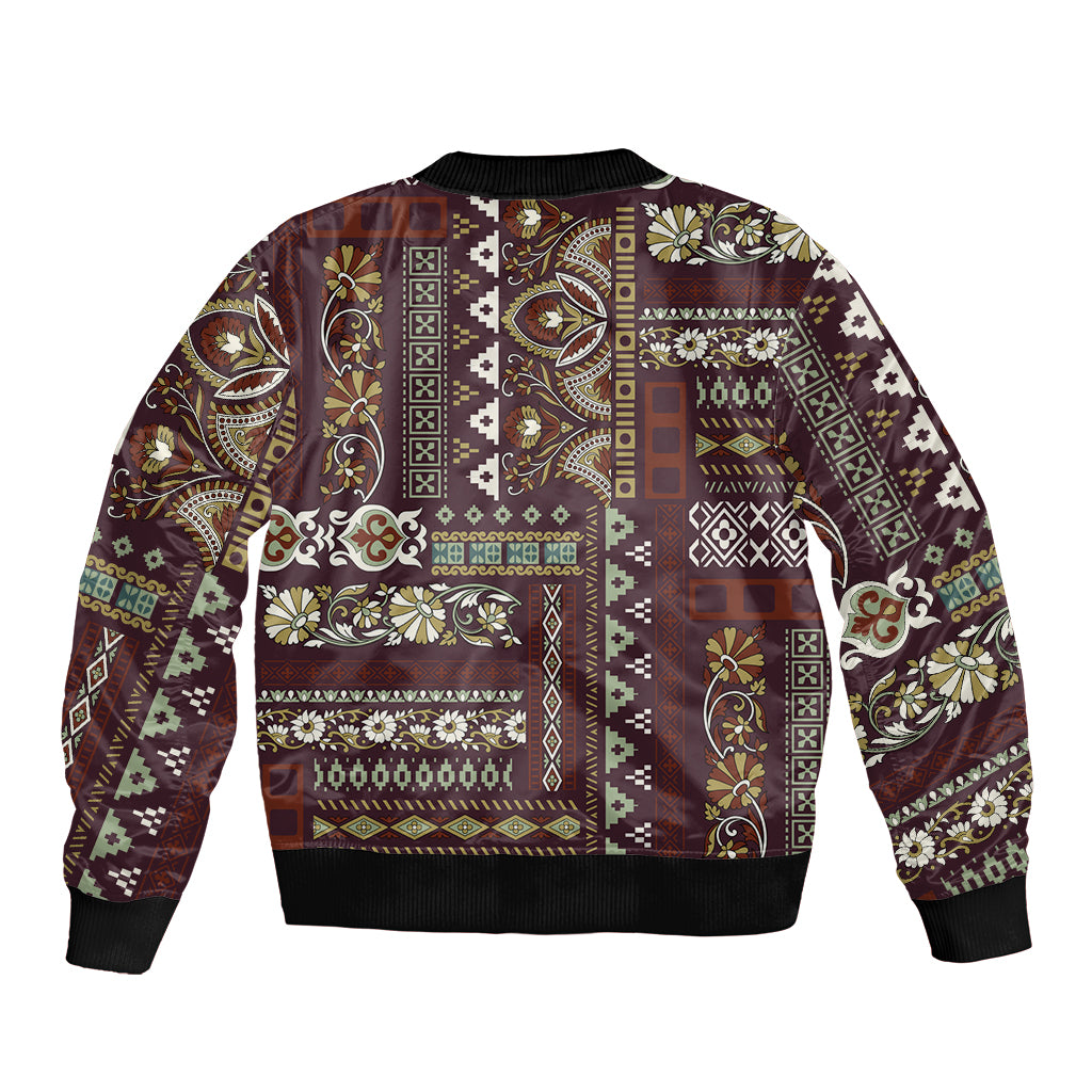 Unisex bomber jacket with brown patchwork pattern, zip front, ribbed collar and cuffs
