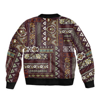 Unisex bomber jacket with brown patchwork pattern, zip front, ribbed collar and cuffs