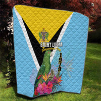 Sky blue quilt with yellow banner, black diagonal stripe, Saint Lucia crest, 1979 and flowers