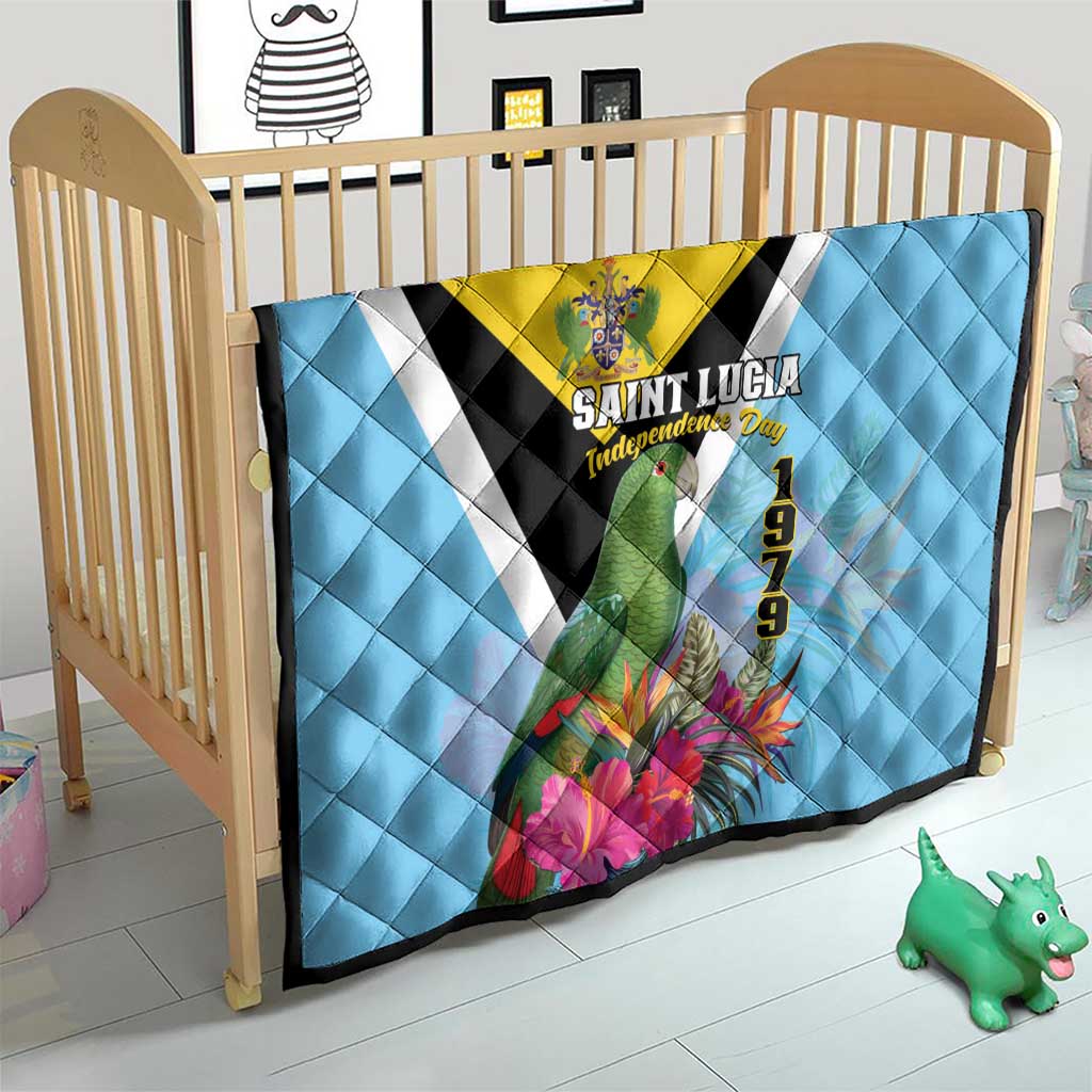 Sky blue quilt on crib with yellow banner, black V stripe, Saint Lucia crest, 1979 and flowers