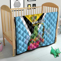 Sky blue quilt on crib with yellow banner, black V stripe, Saint Lucia crest, 1979 and flowers