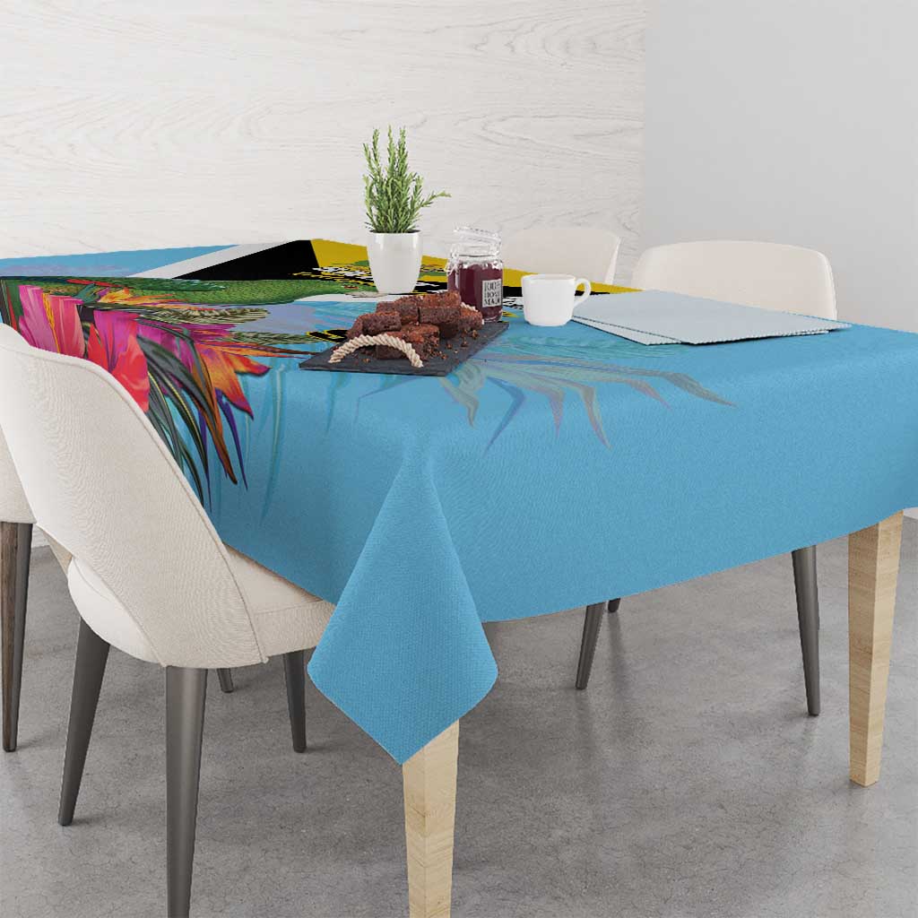 Sky blue tropical tablecloth with colorful leaf and flower pattern on dining table