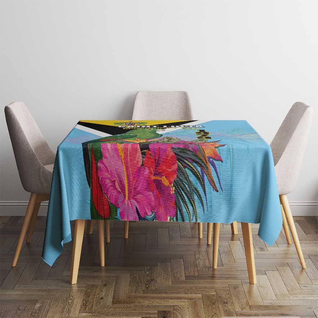 Sky blue tropical tablecloth with large floral and leaf design on dining table