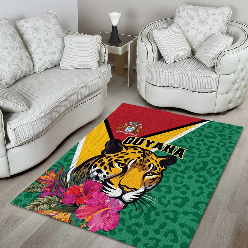Green area rug with jaguar head artwork, tropical flowers, and GUYANA logo on center