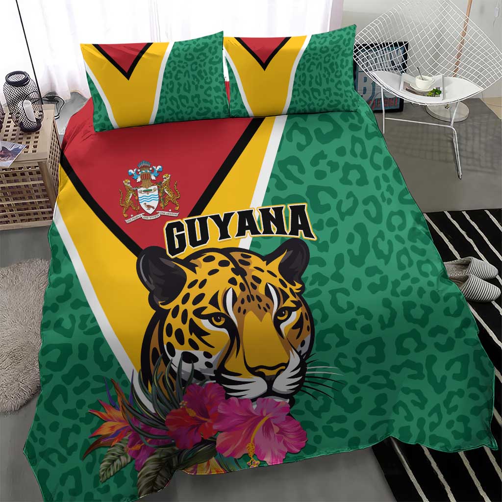 Green bedding set with jaguar portrait, floral bouquet, and Guyana text on duvet