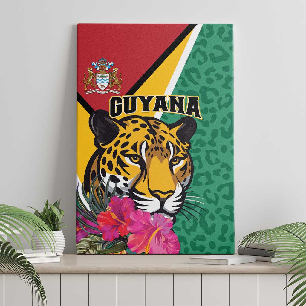 Green canvas wall art with jaguar face artwork, pink hibiscus flowers, and bold Guyana text