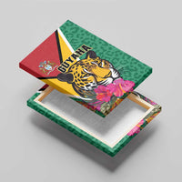 Angled view of green canvas wall art with jaguar artwork and pink hibiscus flowers near the bottom