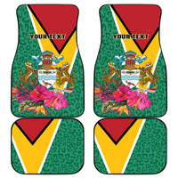 Green car floor mat set of 4 with Guyana crest, tropical flowers, leopard-pattern background