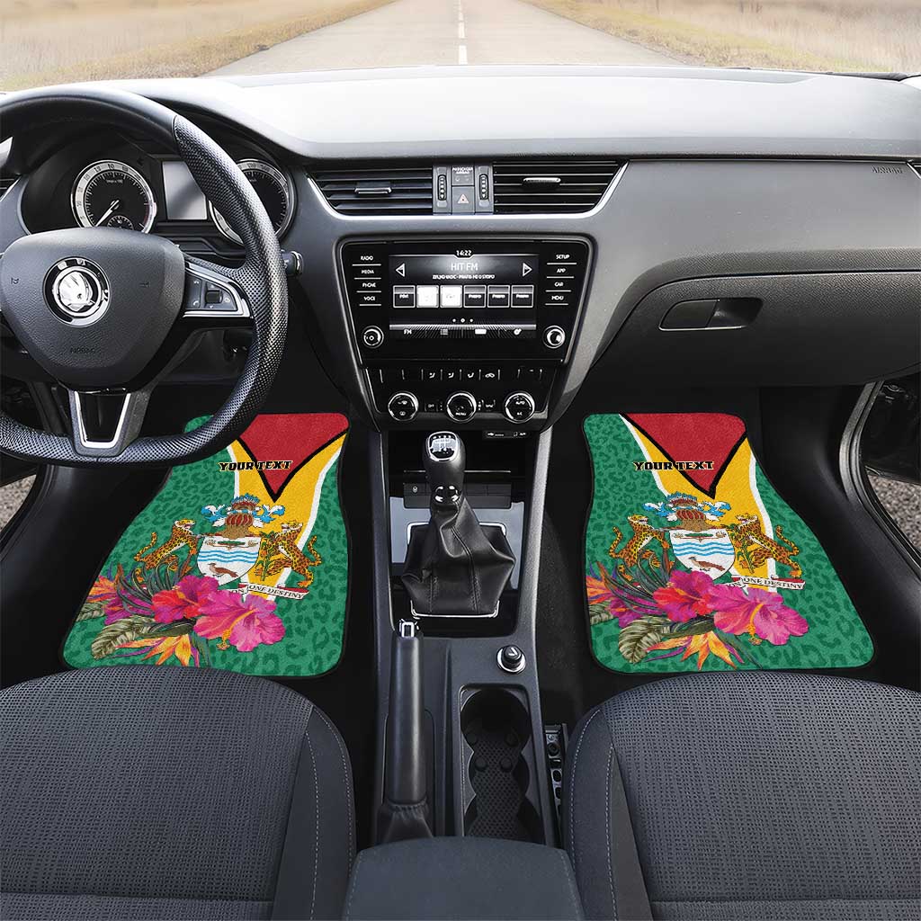 Green front car floor mats (2) with Guyana crest, tropical flowers and red/yellow borders