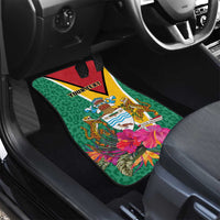 Green car floor mat with Guyana crest, tropical flowers and leopard-pattern background