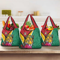 Set of three green grocery tote bags with jaguar artwork and red handles