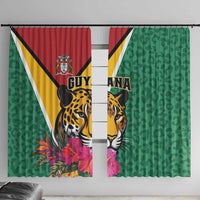 Green window curtain panels with Guyana flag tiger-jaguar print and pink tropical flowers