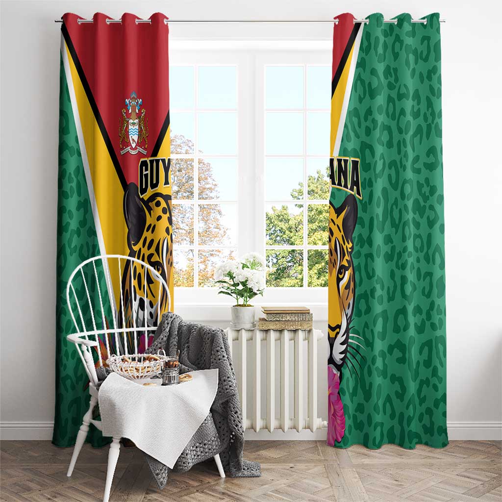 Green window curtain panels with Guyana crest and jaguar design, ring-top header