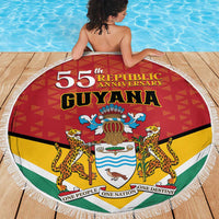 Round Guyana beach blanket showing “55th Republic Anniversary” crest, red yellow green colors
