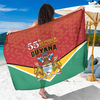 Red Guyana 55th Republic Anniversary sarong with crest, geometric flag-style drape