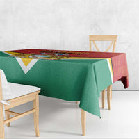 Guyana flag style tablecloth on wooden bench, green center with red top edge