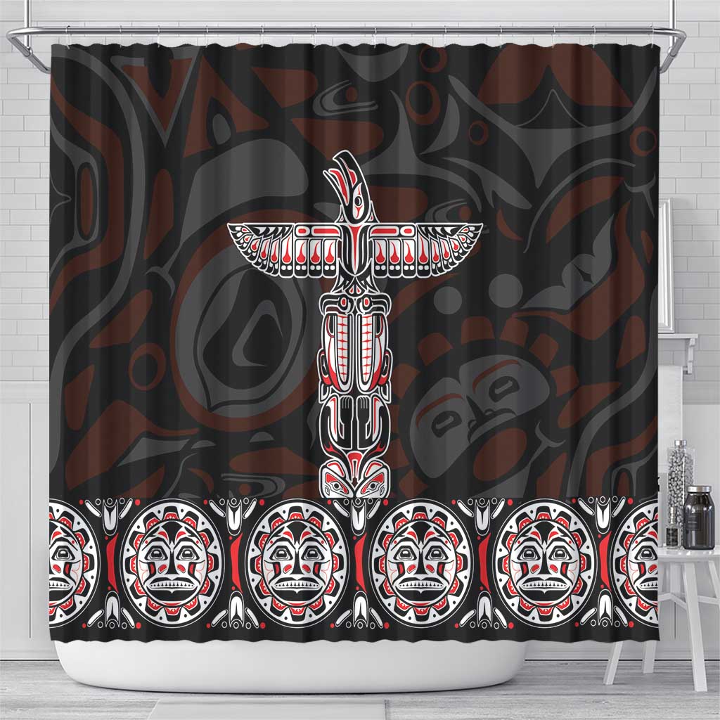 Black shower curtain showing central totem figure above a row of face masks