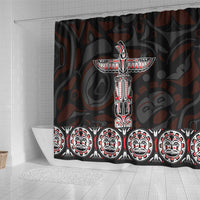 Black shower curtain with central totem figure and row of smiling face masks