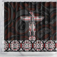 Black shower curtain featuring large totem cross and horizontal line of face masks