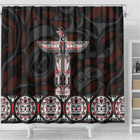 Black shower curtain with tall totem center and repeating face medallion border