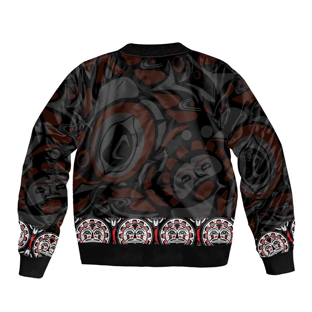 Unisex black zip-up bomber jacket, back view with Haida-style totem and repeating faces