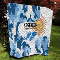 Blue and white camo quilt with sun emblem and Argentina text on grass