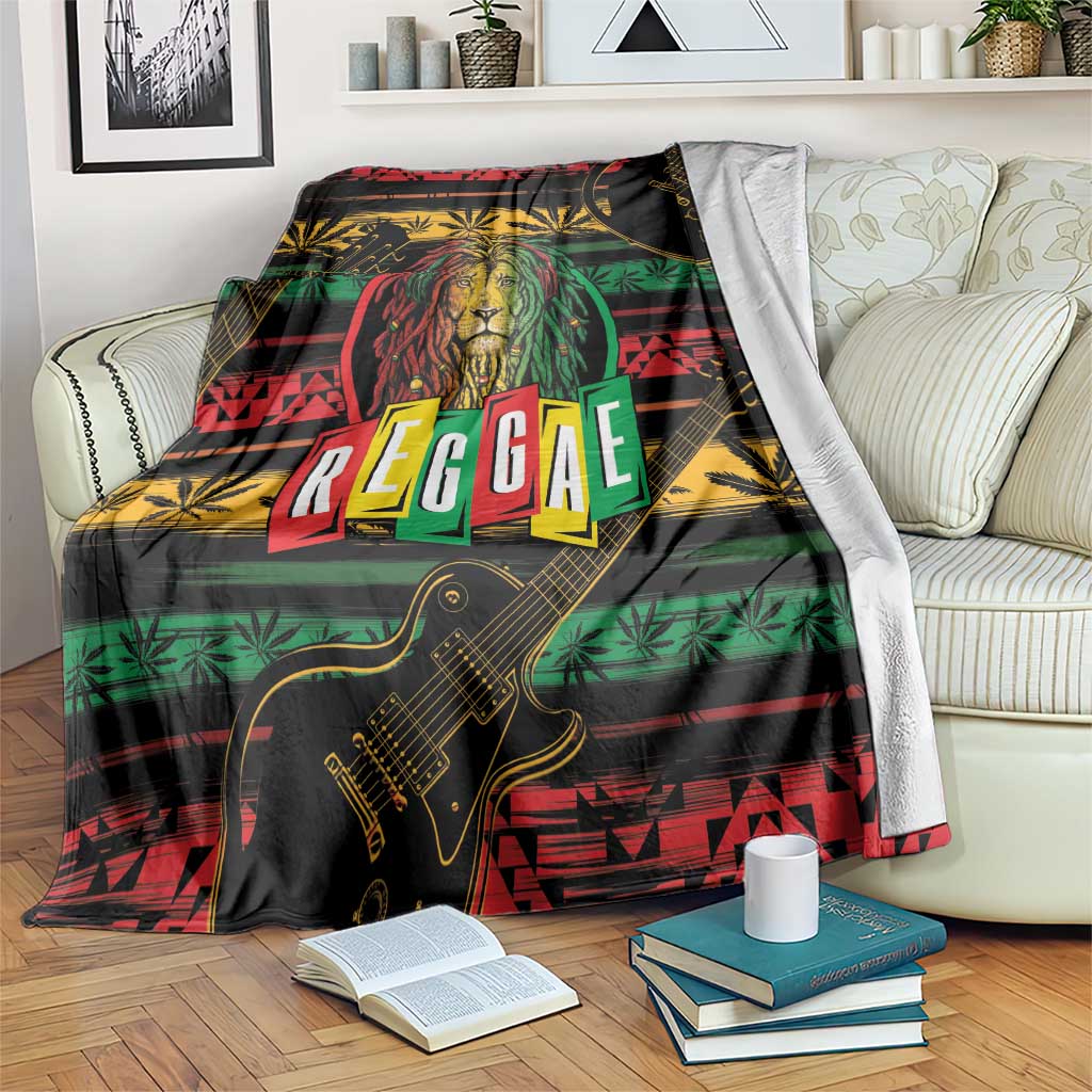 Reggae-themed black blanket with lion head, guitar graphics, and colorful 'REGGAE' text