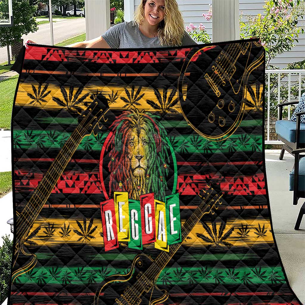 Black reggae quilt held outdoors, lion center and guitar motif with green red yellow bands