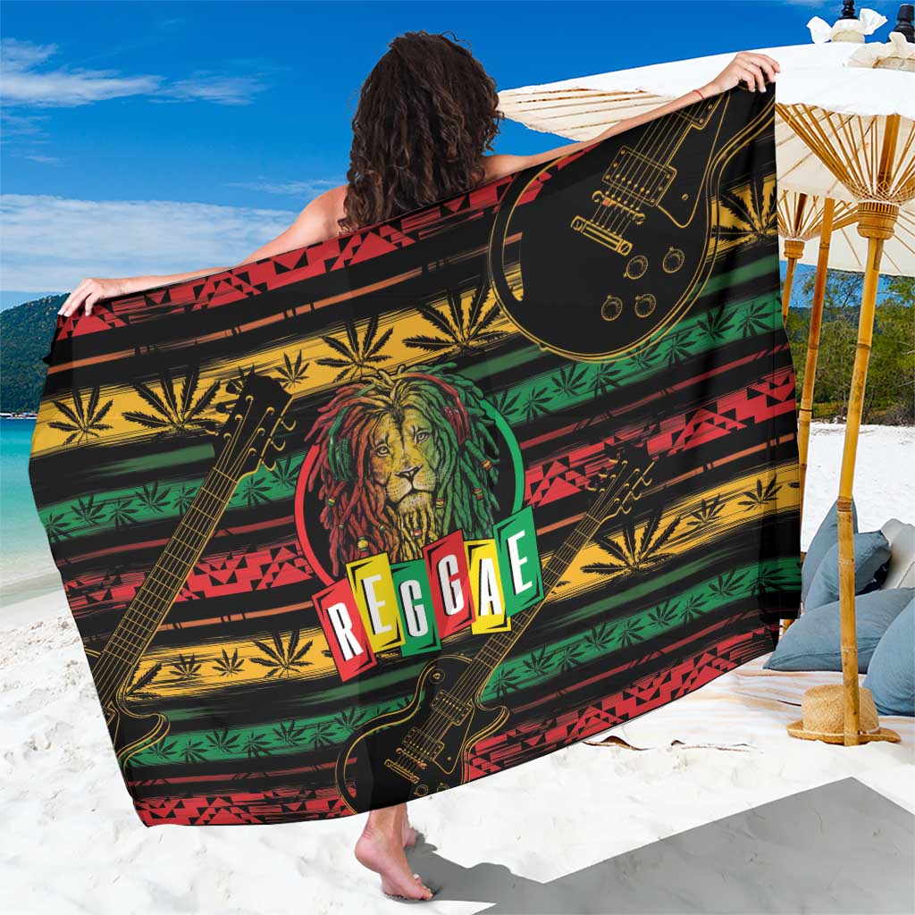 Black reggae sarong with lion graphic, guitars, and bold green red yellow stripes