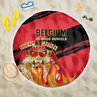 Round beach blanket with red and black Belgium team graphic, white fringe edge
