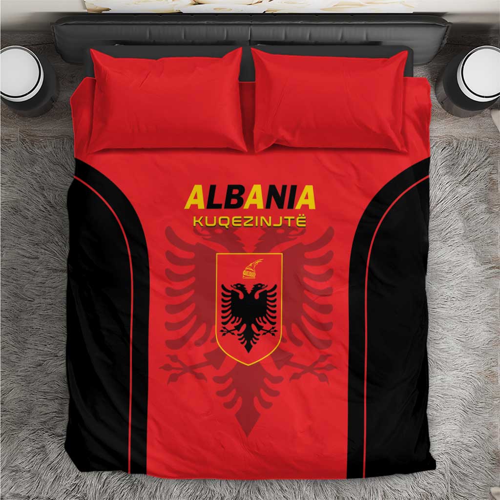 Red and black duvet with two red pillowcases and Albanian crest graphic center
