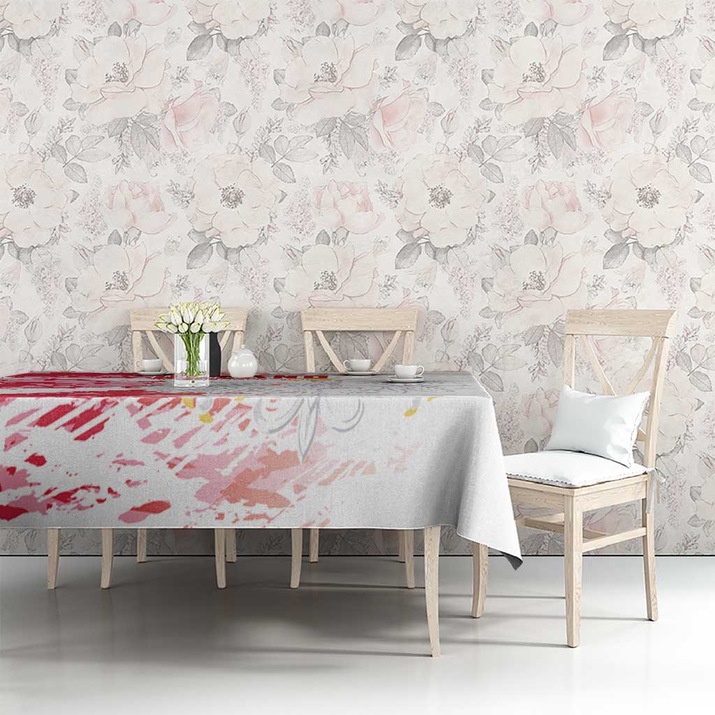Red and white football-themed tablecloth with printed crest graphic and draped edge
