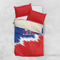 USA soccer bedding set with red and blue comforter and two red pillowcases on light sheet
