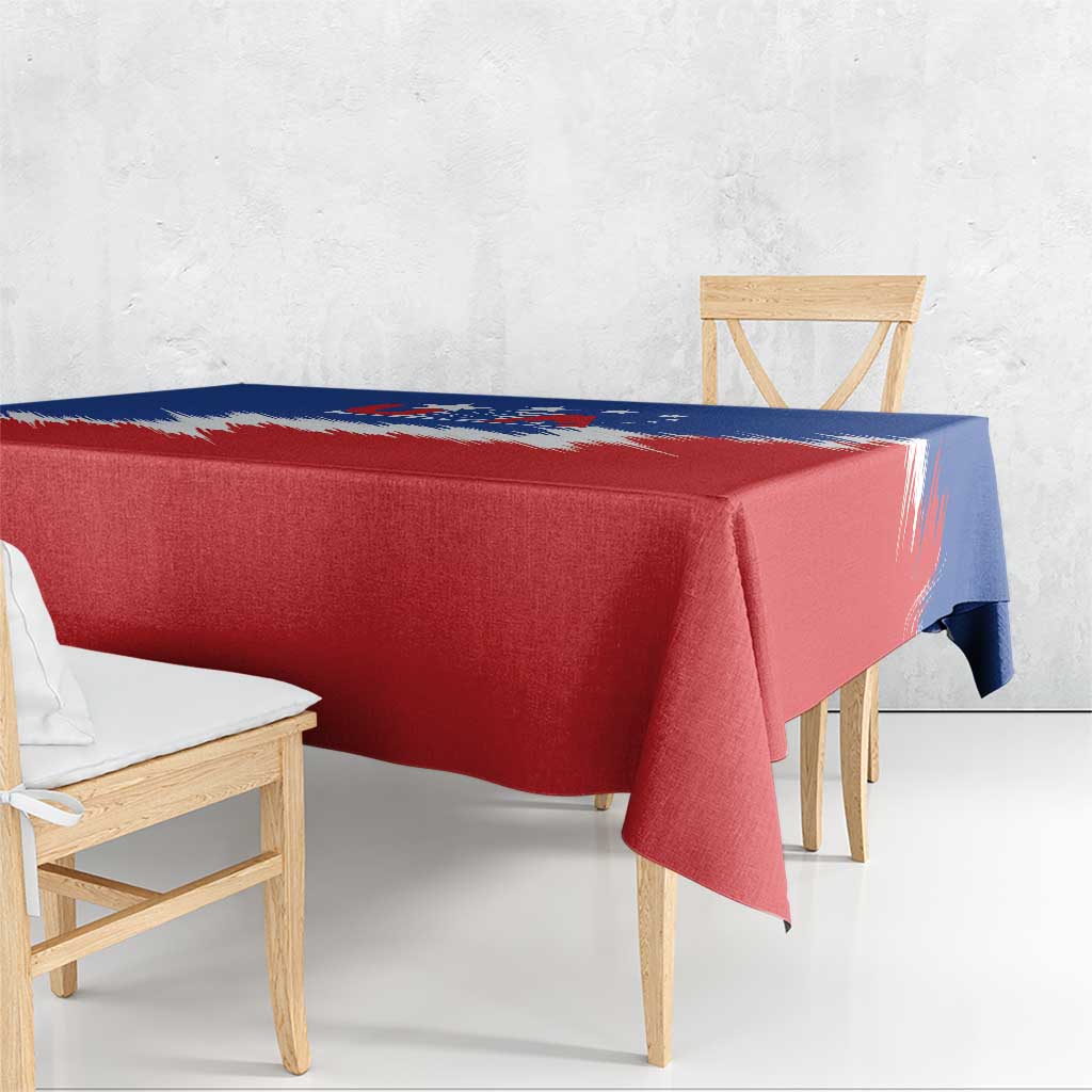 USA-themed tablecloth draped over rectangular table, red and blue with white stripe accents.