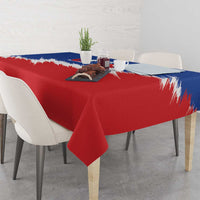 Red and blue USA tablecloth with white brush-stroke stripes, on dining table.