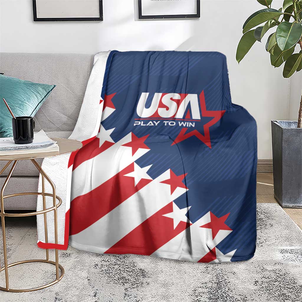 USA soccer themed blanket on floor with USA logo, stars, and red-white-blue flag graphics