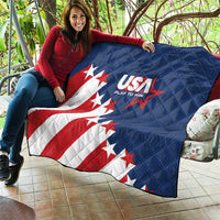 Blue quilt blanket with USA logo, stars, red-and-white stripe design, diamond stitching