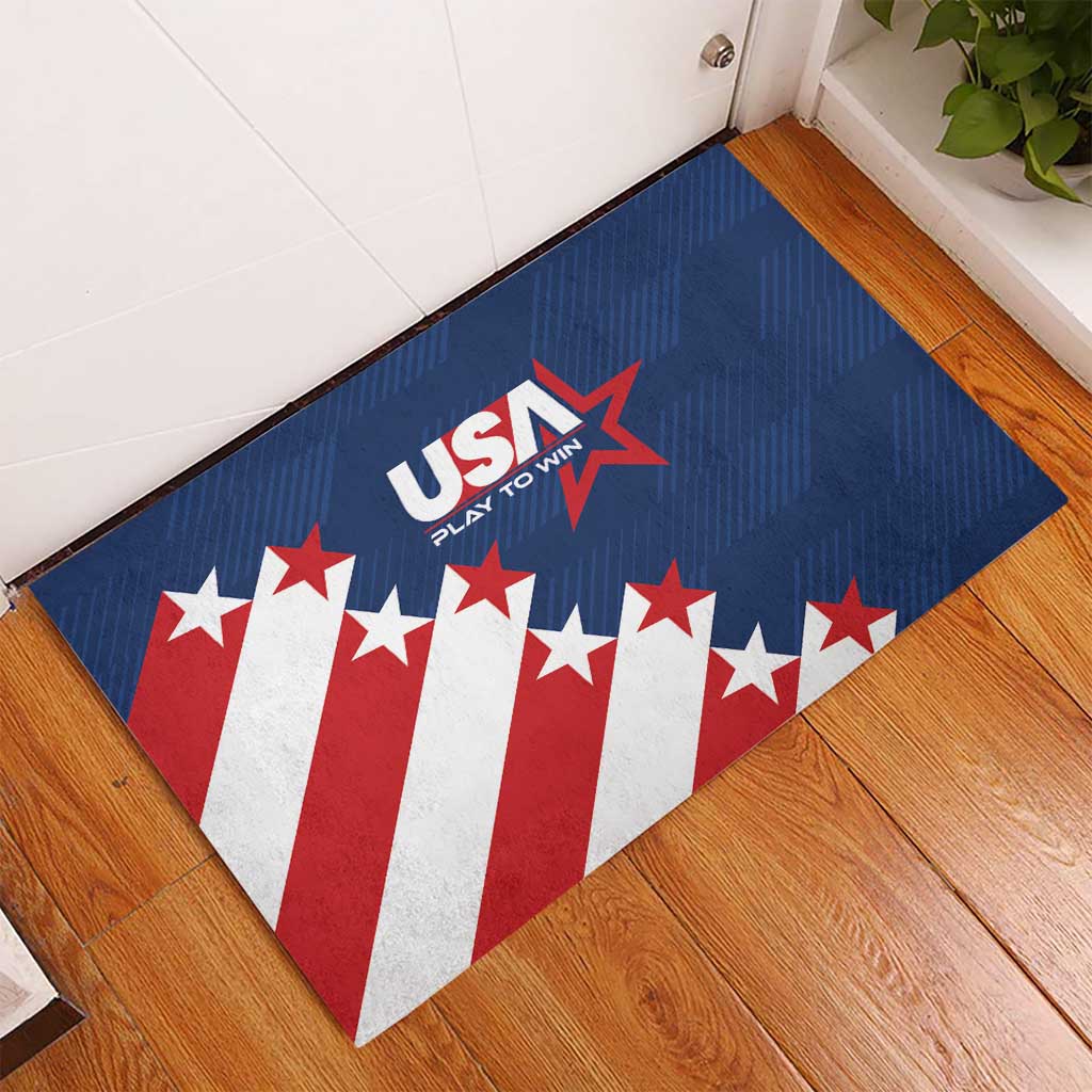 Blue rubber USA doormat on wood floor with flag stripes and star 'USA Play To Win' logo