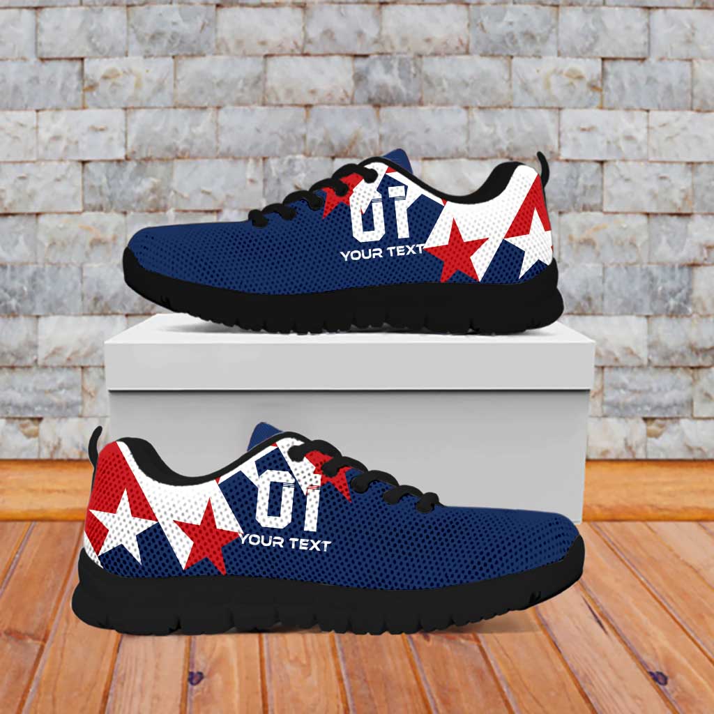 Blue and white low-top soccer sneakers with red stars and black rubber sole.